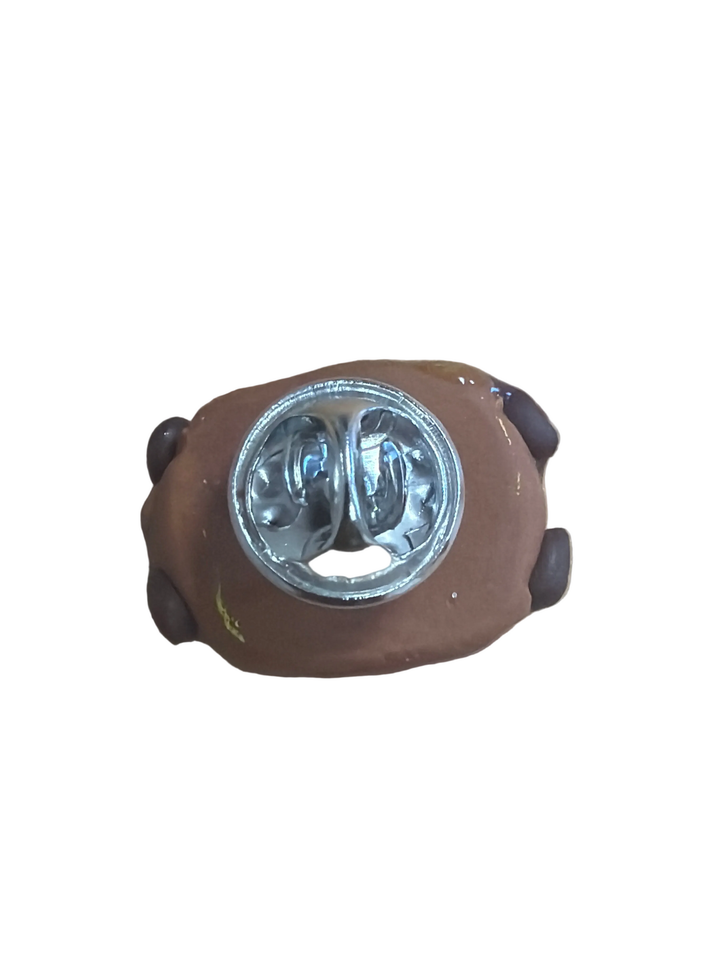 Arrière du pin’s chocolatine